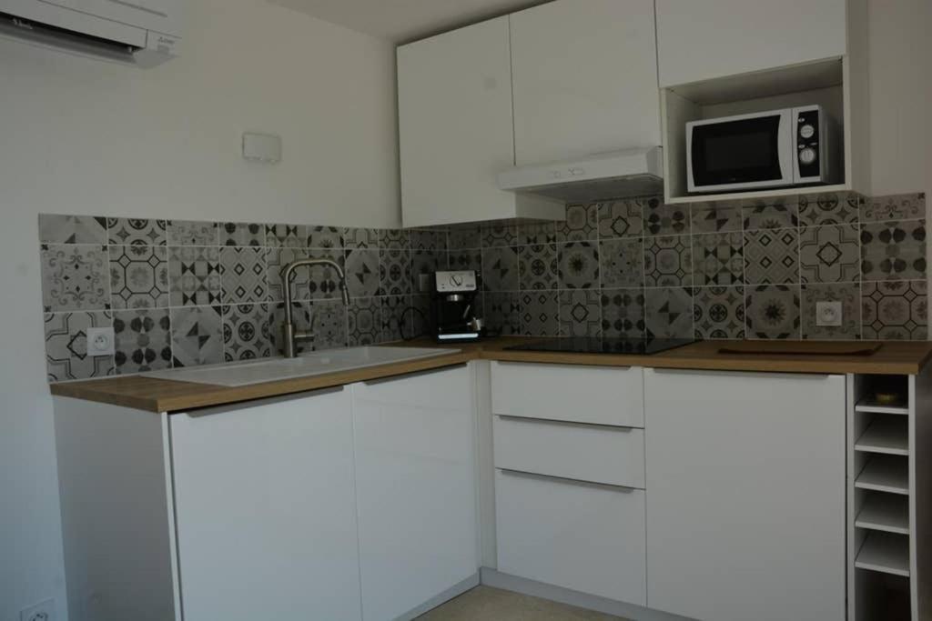 La Venturonne Appartement Neuf Rez De Jardin 45 M2 Vue Mer Et Vignes 10 Mn Des Plages Ле-Боссе Экстерьер фото